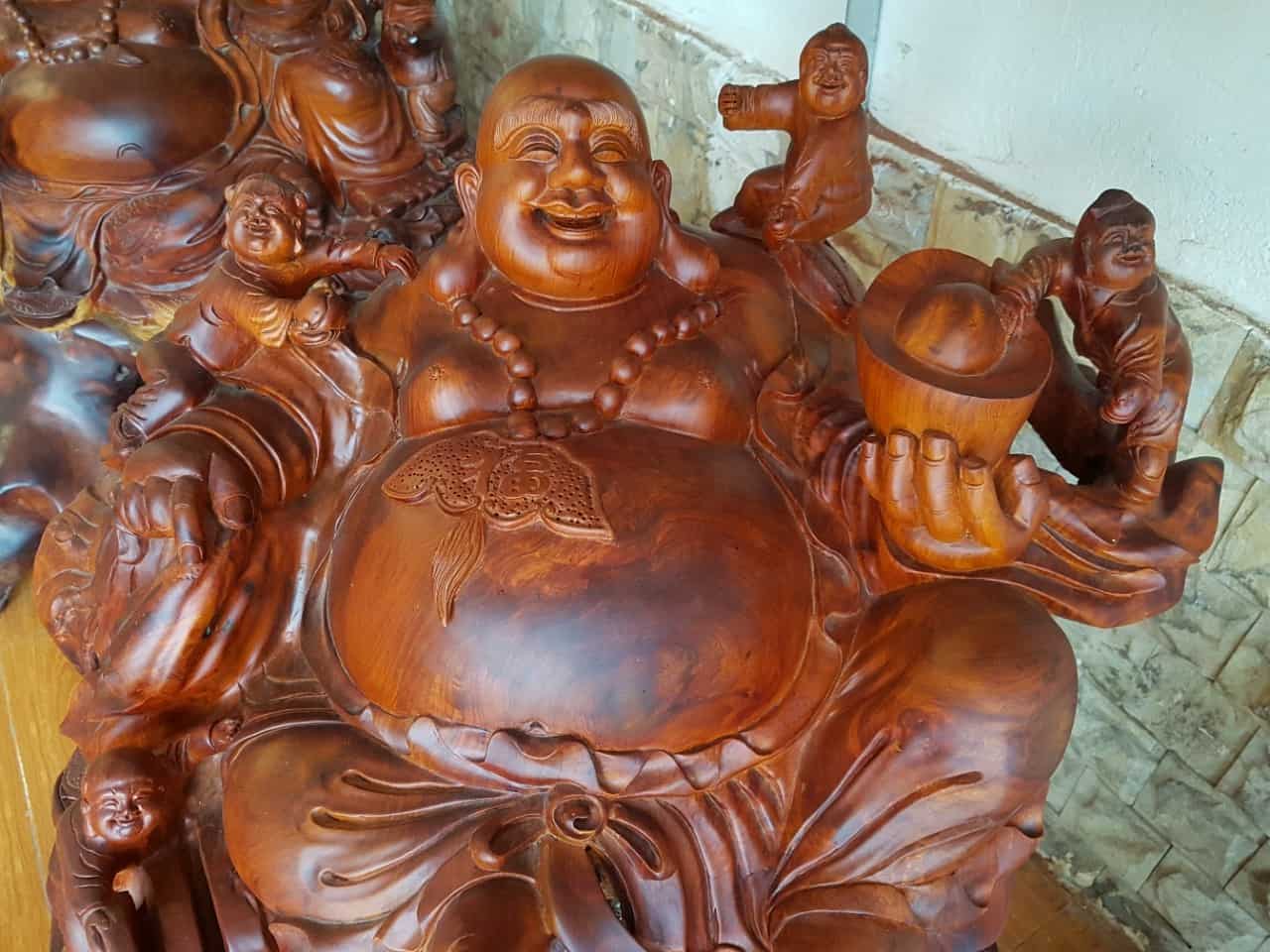 Tượng Di Lặc ngồi ngũ phúc gỗ hương ôm đá