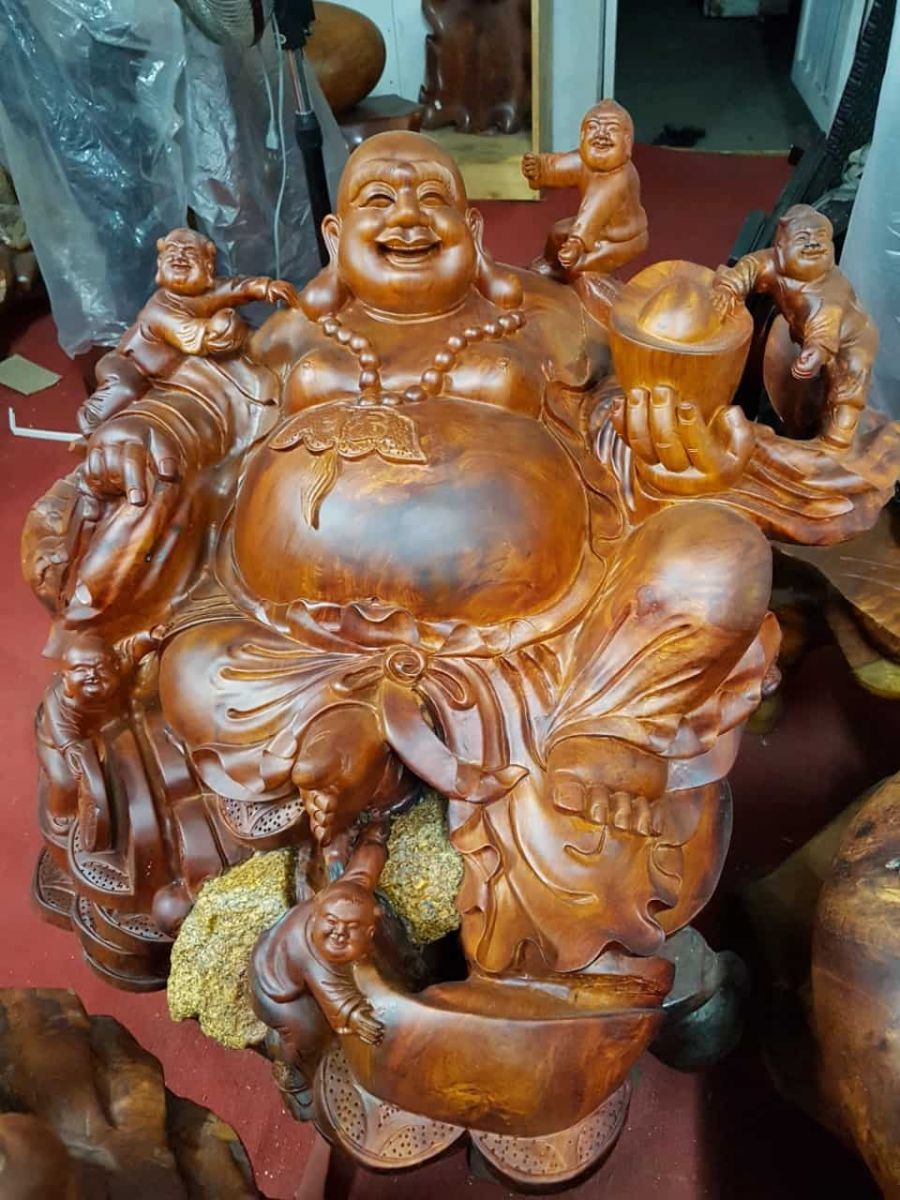 Tượng Di Lặc ngồi ngũ phúc gỗ hương ôm đá