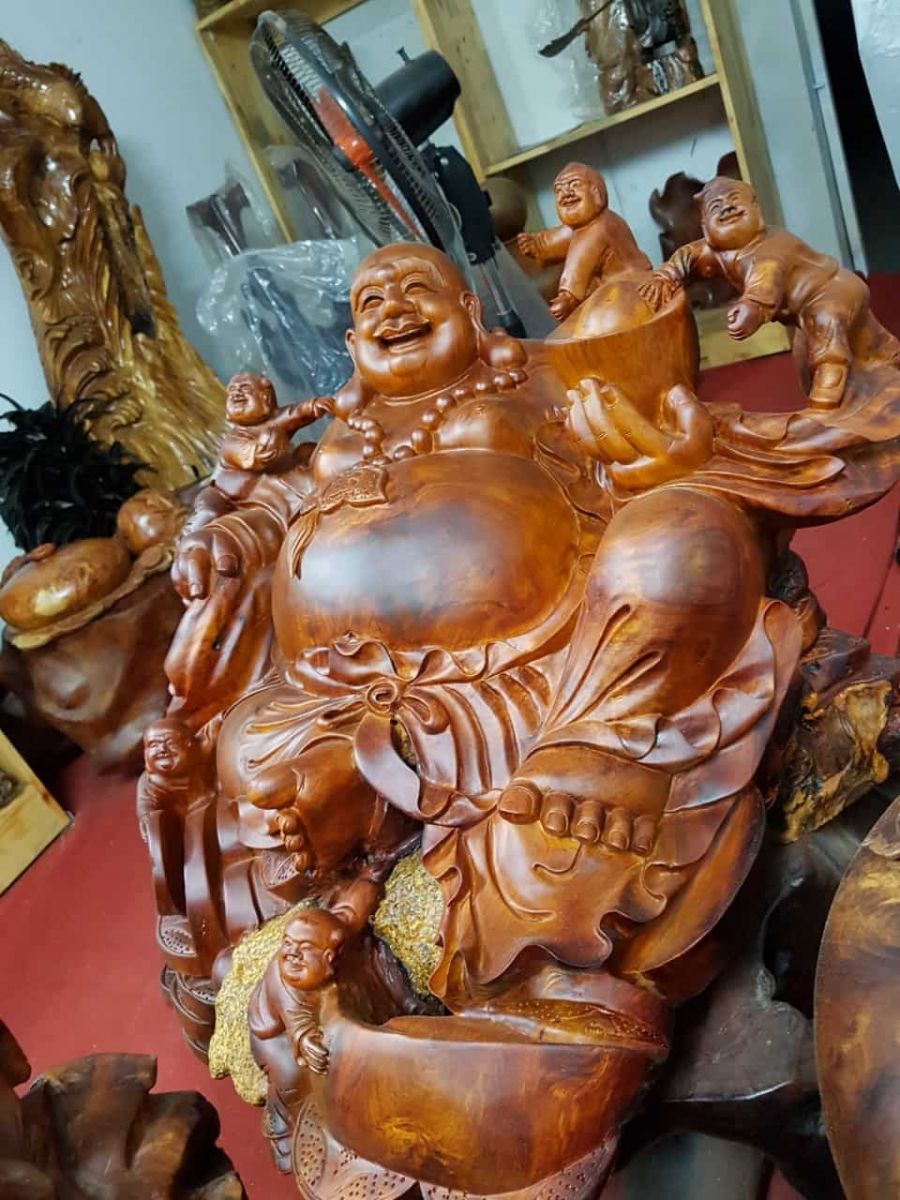 Tượng Di Lặc ngồi ngũ phúc gỗ hương ôm đá